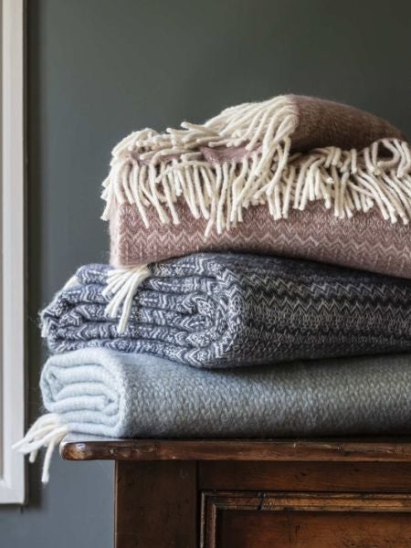National Trust wool blankets and throws in blue and pink