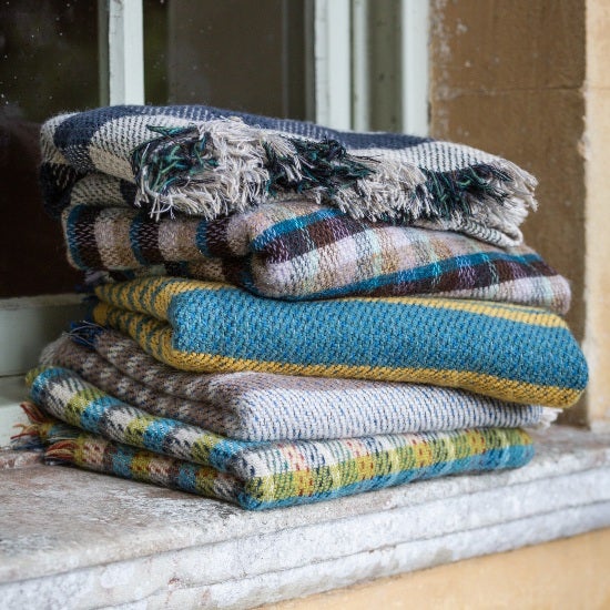 A collection of National Trust recycled rugs