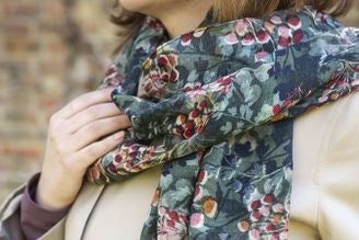 Scarves - image shows model wearing the National Trust Hedgeberries scarf