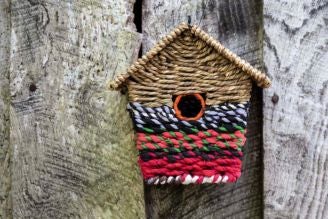 Birds & wildlife - image shows the recycled bird house on a silver wood shed