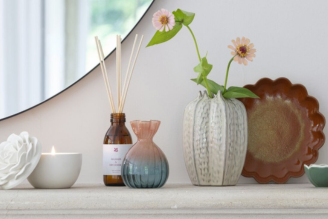 Decorative accessories - image shows George the Mouse, a hanging decoration from our autumn winter range, held in a person's hands. 