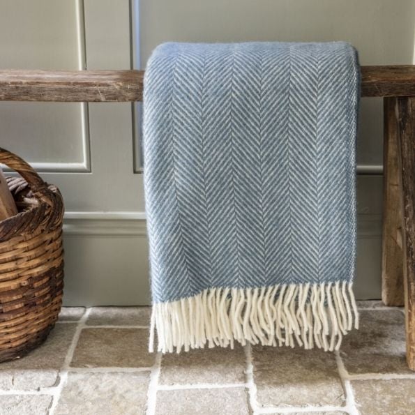 National trust throws and blanket in blue with herringbone detail