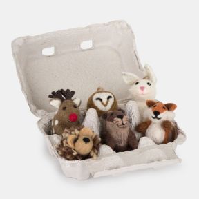 Felt woodland Christmas hanging decoration gift set featuring handcrafted felt ornaments including a reindeer, owl, rabbit, otter, fox and pine cone, presented in a recycled egg carton gift box with rustic twine hanging loops.