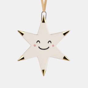 White ceramic star Christmas hanging decoration featuring a smiling face with pink cheek details, gold-tone tipped points, a glossy glazed finish, and a gold hanging ribbon for festive seasonal décor.
