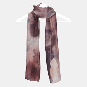 Abstract watercolor print scarf in blush pink, mauve and plum tones, featuring lightweight semi-sheer fabric and a long rectangular design draped on a hanger.