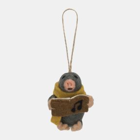 Felt mole Christmas hanging decoration featuring a dark grey wool-effect body, mustard yellow scarf, pink nose and paws, and a brown carol songbook with musical note detail, finished with handcrafted needle-felted detailing and a rustic twine hanging loop