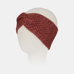 Rust orange knitted headband with a twisted knot front, textured basket-weave stitch pattern, and soft marl finish for cosy cold-weather styling.