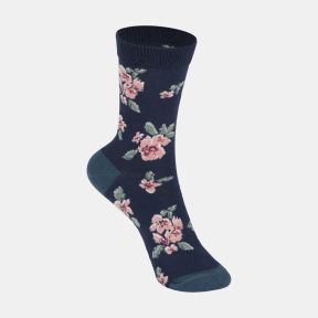 Navy blue floral ankle socks with soft pink flower pattern, sage green leaves, contrasting teal heel and toe, and a ribbed cuff.
