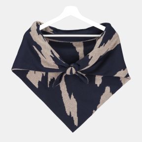 Navy and beige triangular knitted scarf with a bold abstract pattern, soft fine-knit texture, and wrap-around design, displayed tied at the front on a hanger for stylish cold-weather layering.