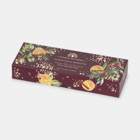 Gift box containing Christmas Wreath luxury vegetable soaps, decorated with festive illustrations of dried orange slices, cinnamon sticks, berries, greenery and gold accents. Scented with orange, clove and cinnamon, vegan and made in England.
