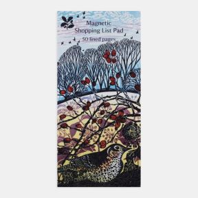 National Trust magnetic shopping list pad featuring a linocut-style winter woodland illustration with a fieldfare bird perched among red berries and bare trees, set against a pale blue sky with birds in flight, with the text “Magnetic Shopping List Pad” a
