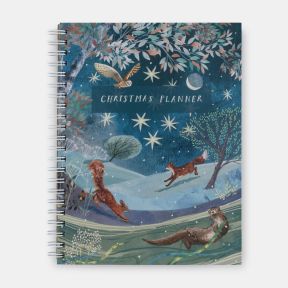 National Trust Christmas Planner spiral-bound notebook featuring a winter wildlife illustration with an owl in flight, a fox, a squirrel and an otter in a snowy countryside landscape beneath a star-filled night sky and crescent moon, with “Christmas Plann