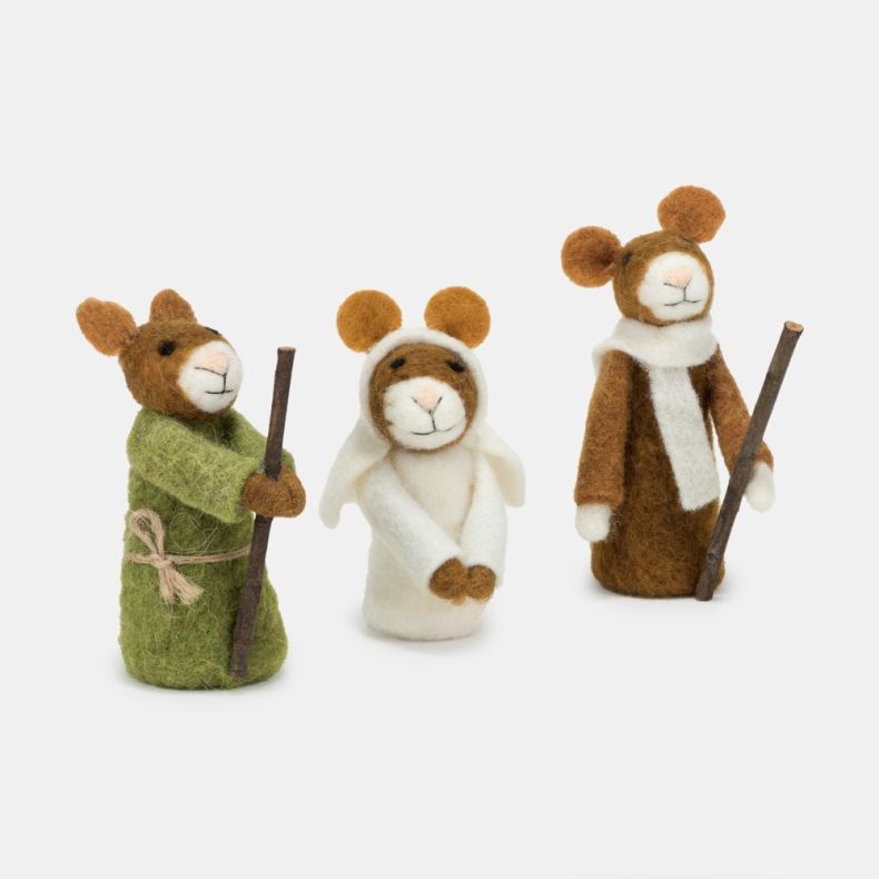 Three handcrafted felt nativity mouse figures displayed against a light background. The set includes a shepherd mouse wearing a moss green robe tied with twine and holding a wooden staff, an angel mouse dressed in white with small felt wings, and a taller