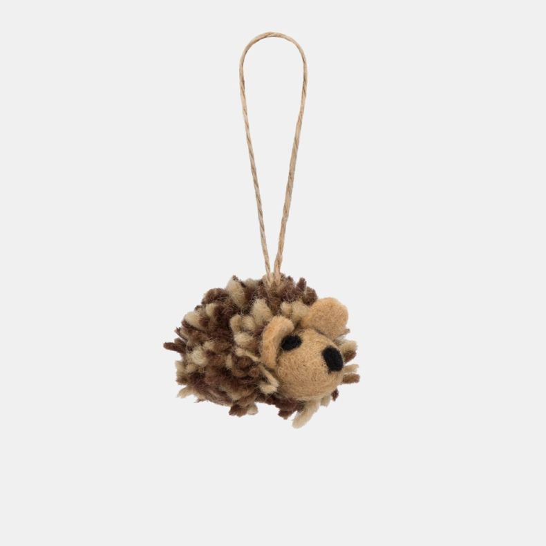 Felt hedgehog Christmas hanging decoration featuring a soft brown and cream wool-effect body, detailed needle-felted face with black nose and eyes, textured spiky coat, and rustic twine hanging loop.