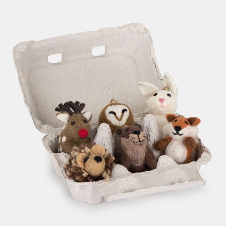 Felt woodland Christmas hanging decoration gift set featuring handcrafted felt ornaments including a reindeer, owl, rabbit, otter, fox and pine cone, presented in a recycled egg carton gift box with rustic twine hanging loops.