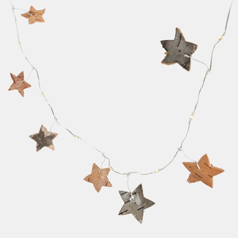 LED birch star garland featuring natural wooden star-shaped ornaments suspended along a thin silver wire string with integrated warm white LED lights. The stars are cut from genuine birch bark, displaying natural variations in colour and texture, with ton