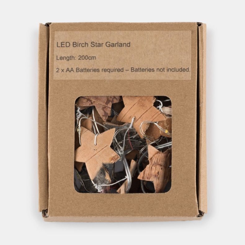 Kraft cardboard retail box containing an LED Birch Star Garland, displayed against a light background. The front of the box features a clear window revealing the garland inside, including natural birch wood star shapes attached to a silver wire string wit