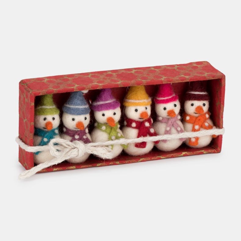 Set of six felt snowman Christmas hanging decorations featuring white wool-effect bodies, orange carrot noses, and colourful knitted hats and scarves in green, blue, purple, yellow, pink and burgundy tones, presented in a red patterned gift box tied with 