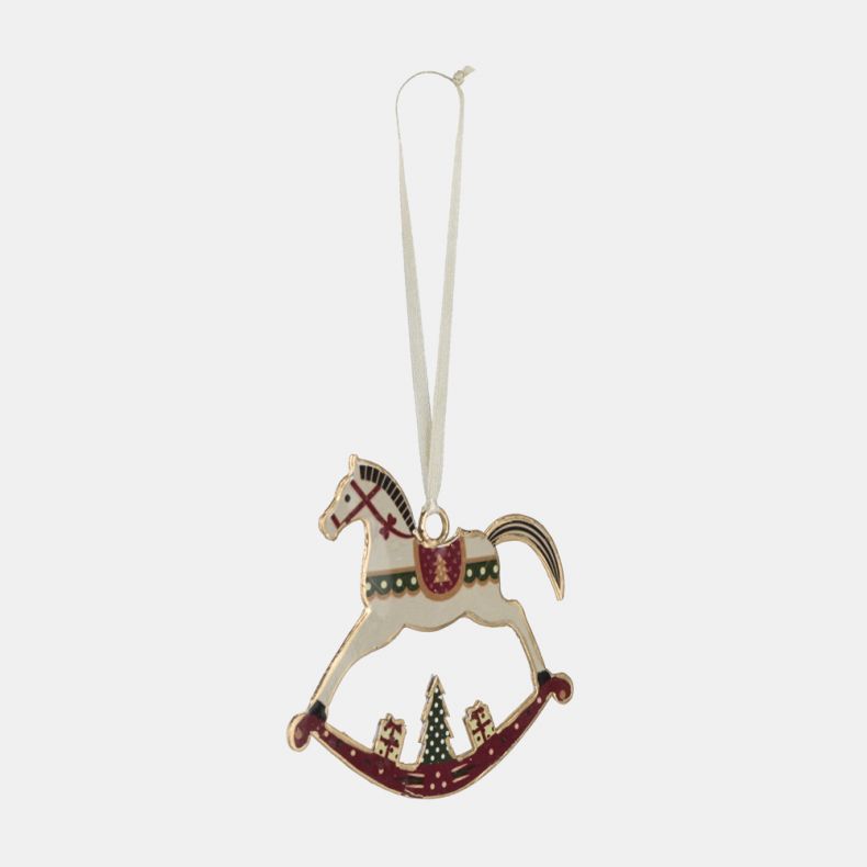 Wooden rocking horse Christmas hanging decoration shown from an angled side view, featuring a cream horse with red and green festive saddle details, a curved rocking base with Christmas tree and gift motifs, gold-tone edging, and a cream ribbon hanging lo