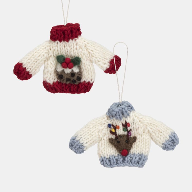 Set of two knitted Christmas jumper hanging decorations featuring a festive Christmas pudding design with holly leaves and red berries, and a reindeer design with a red nose and multicoloured lights on the antlers, both finished with ribbed trim and white