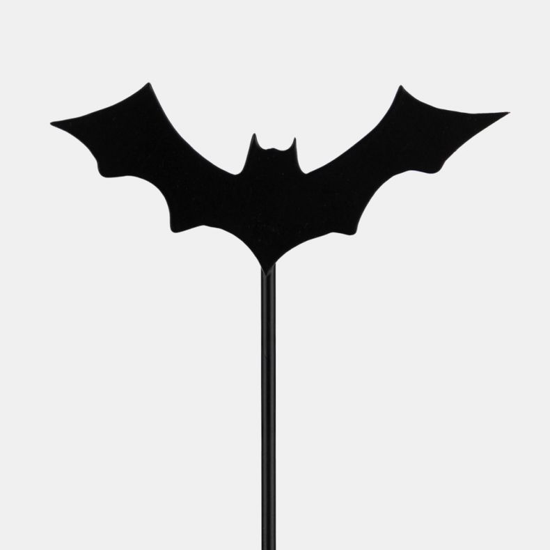 Close-up of a metal garden stake featuring a black bat silhouette with outstretched wings, mounted on a slender metal rod and isolated on a white background.