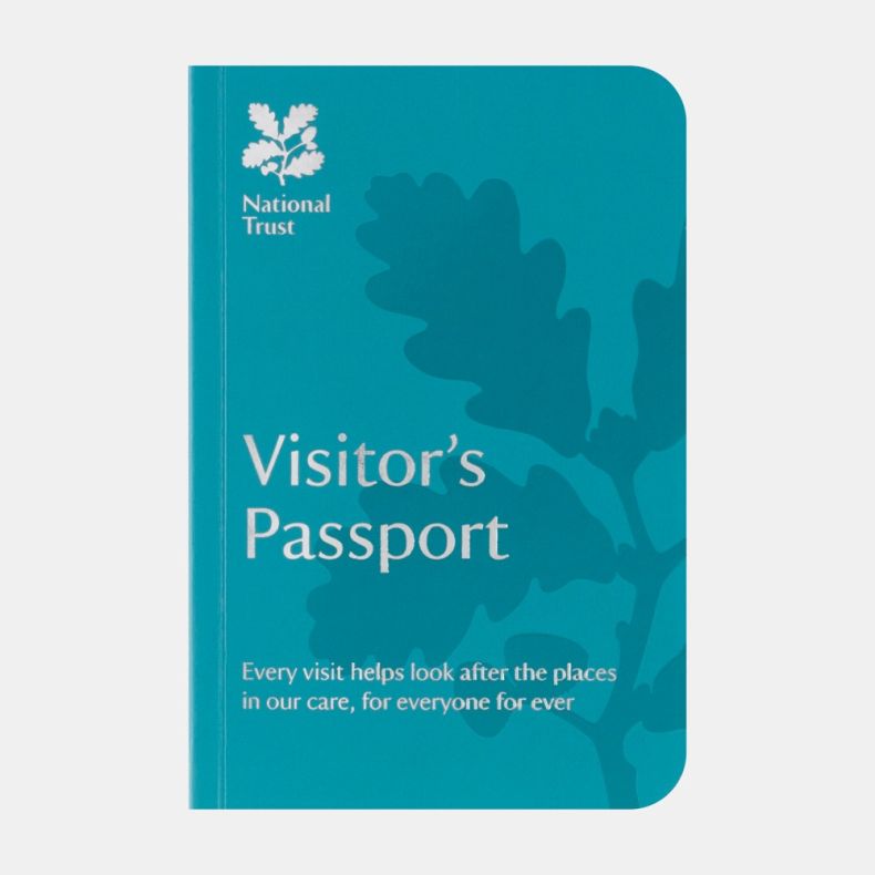 National Trust Visitor’s Passport booklet with a turquoise cover, featuring the National Trust logo, white “Visitor’s Passport” text and stylised oak leaf artwork, designed for collecting visit stamps and isolated on a white background.