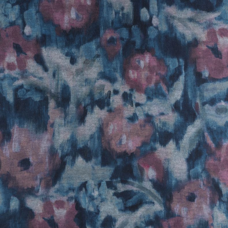 Abstract watercolor print scarf in shades of blue, teal and mauve, shown in a close-up view highlighting the soft brushed texture and artistic floral-inspired pattern.