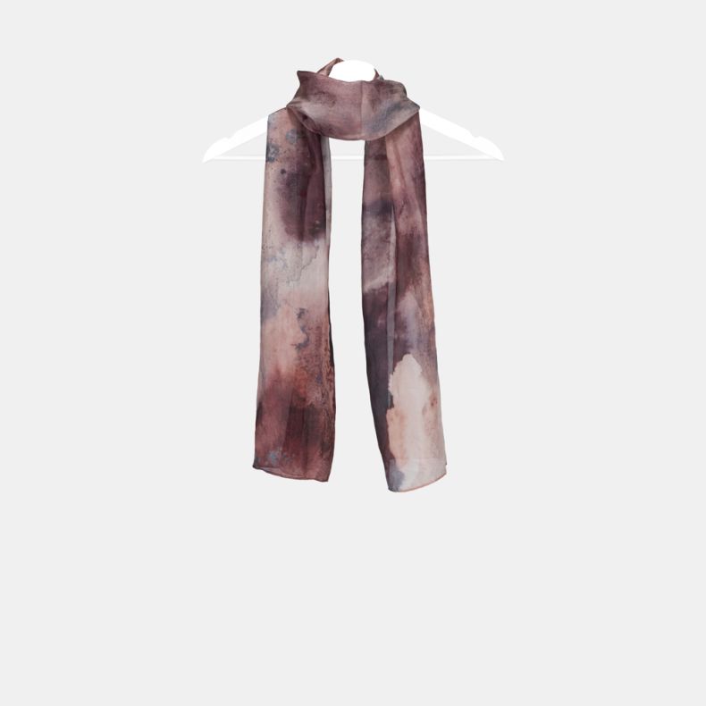 Abstract watercolor print scarf in blush pink, mauve and plum tones, featuring lightweight semi-sheer fabric and a long rectangular design draped on a hanger.