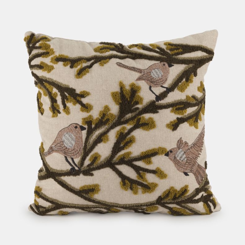 Embroidered and tufted cushion featuring delicate birds perched among branching foliage on a soft neutral background. Textured detailing in warm brown and mustard tones adds depth and character, creating a cosy nature-inspired design for living rooms and 