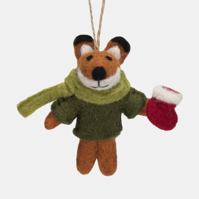 Felt fox Christmas hanging decoration shown from the reverse side, featuring an orange wool-effect tail, dark green coat, light green scarf, red mug, and needle-felted handcrafted detailing, finished with a rustic twine hanging loop.