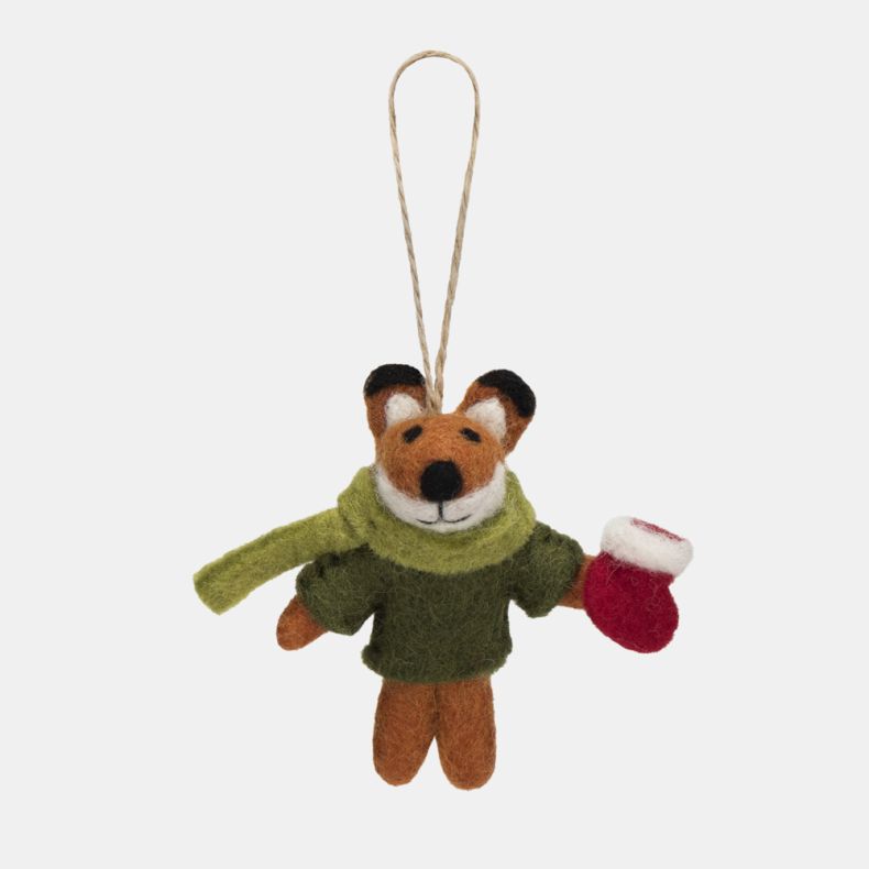 Felt fox Christmas hanging decoration featuring an orange and white wool-effect body, dark green coat, light green scarf, and a red mug, finished with needle-felted detailing and a rustic twine hanging loop.