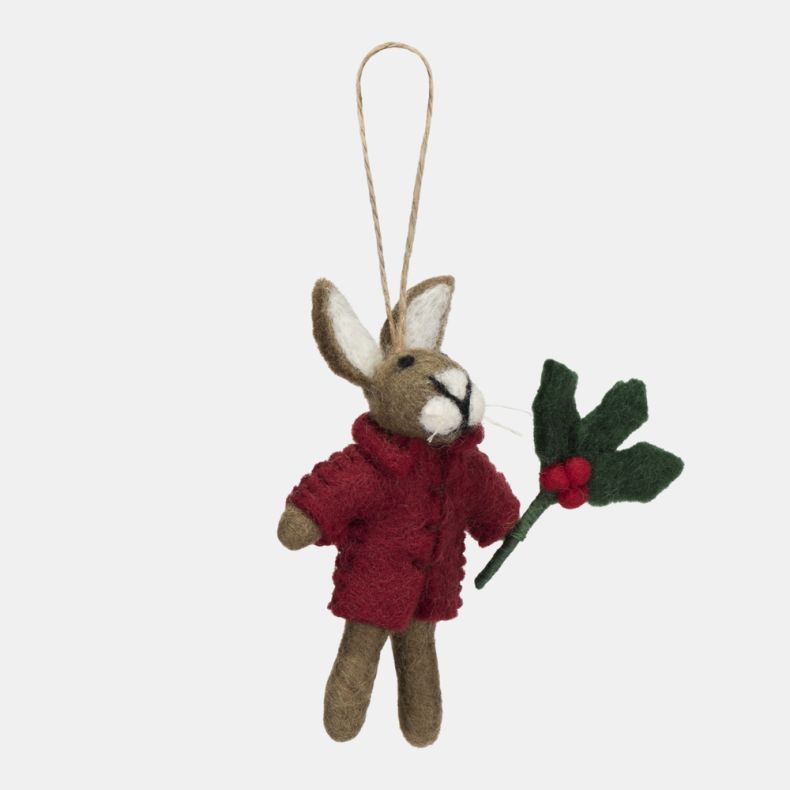 Felt hare Christmas hanging decoration shown from an angled side view, featuring a grey-brown wool-effect body, bright red coat, and a holly sprig with red berries, finished with handcrafted needle-felted detailing and a rustic twine hanging loop.