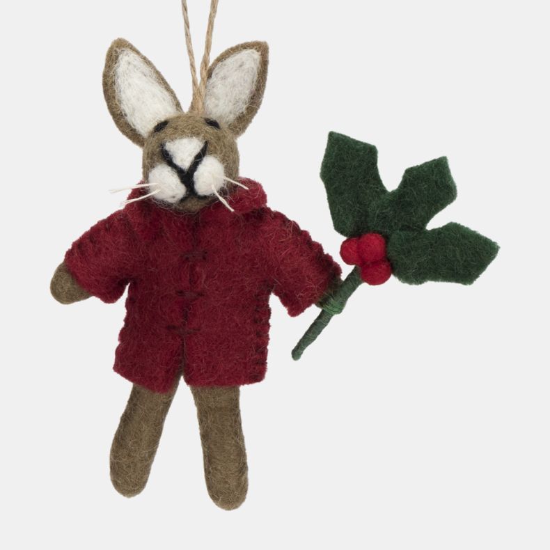 Felt hare Christmas hanging decoration shown in a close-up front view, featuring a grey-brown wool-effect body, bright red coat, and a holly sprig with red berries, finished with handcrafted needle-felted detailing and a rustic twine hanging loop.