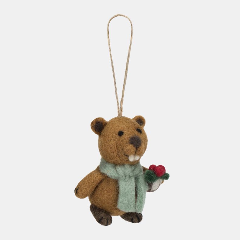 Felt beaver Christmas hanging decoration shown from an angled side view, featuring a brown wool-effect body, pale blue scarf, and a holly sprig with red berries, finished with handcrafted needle-felted detailing, embroidered facial features, and a rustic 