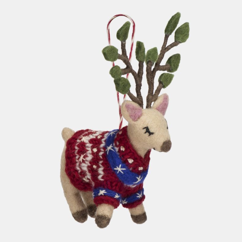Felt hanging reindeer Christmas decoration shown from an angled side view, featuring green leaf-tipped antlers, embroidered closed-eye detailing, and a red knitted jumper with blue and white festive pattern accents, suspended from a red and white hanging 