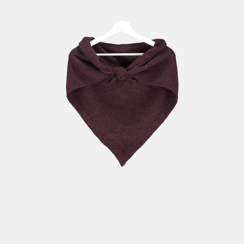 Burgundy triangular knitted scarf with a soft brushed texture and ribbed trim, styled tied at the front and displayed on a hanger, shown from a wider front view for cosy cold-weather layering.