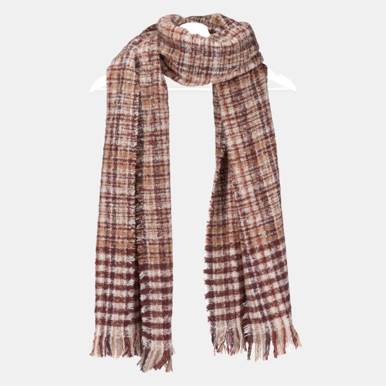Rust and cream woven check scarf with an all-over plaid pattern, featuring a soft textured weave, warm autumnal tones, and fringed ends, displayed draped on a hanger.