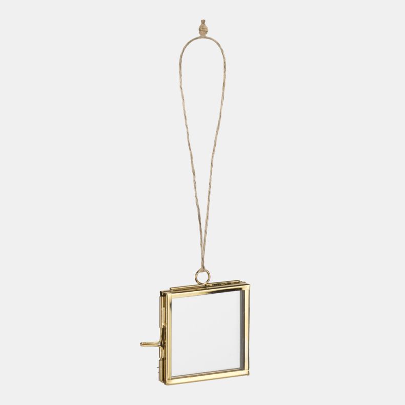 Gold-tone hanging photo frame decoration featuring a square glass display case with hinged opening, metal clasp fastening, and natural twine hanging loop for displaying photographs, pressed flowers, or keepsakes.