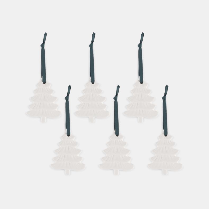 Set of six white ceramic Christmas tree decorations with embossed branch detailing and teal hanging ribbons, designed for festive seasonal décor and suitable for use with home fragrance oils.