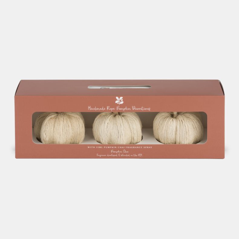 Handmade rope pumpkin decoration set featuring three cream-coloured rope pumpkins presented in a terracotta gift box. Includes a 15ml Pumpkin Chai fragrance spray, creating a seasonal autumn display suitable for home décor or gifting.