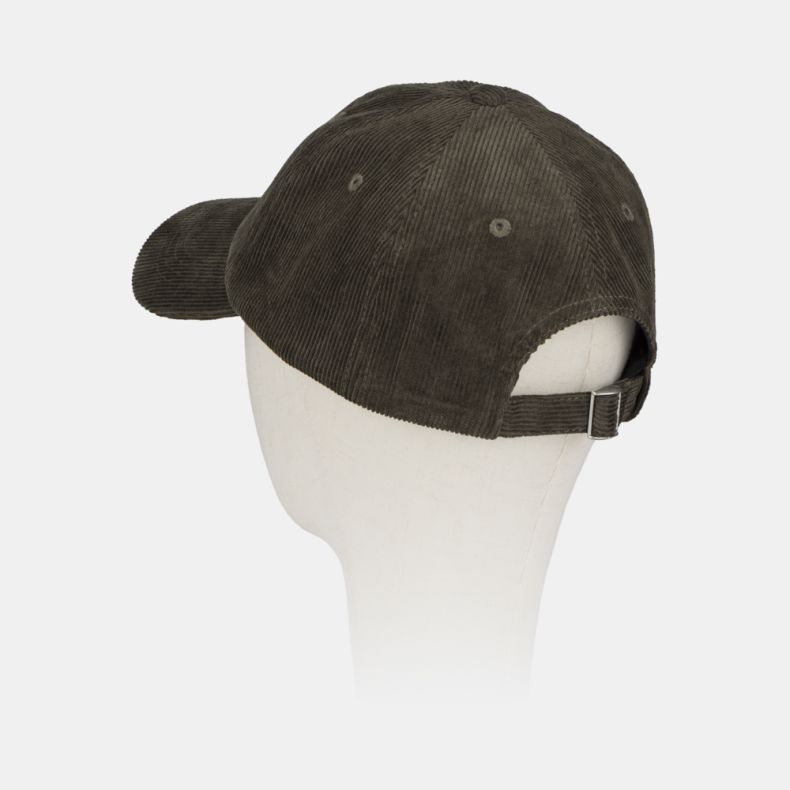 Green corduroy baseball cap shown from a rear angled view, featuring a classic six-panel design, embroidered ventilation eyelets, adjustable back strap with metal buckle, and soft fine-wale cord texture.