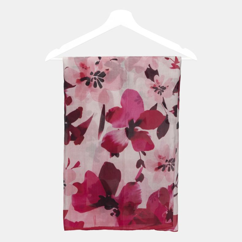Pink floral square scarf folded on a hanger, featuring an oversized watercolour-style flower print in shades of pink, fuchsia, burgundy and blush on lightweight semi-sheer fabric.