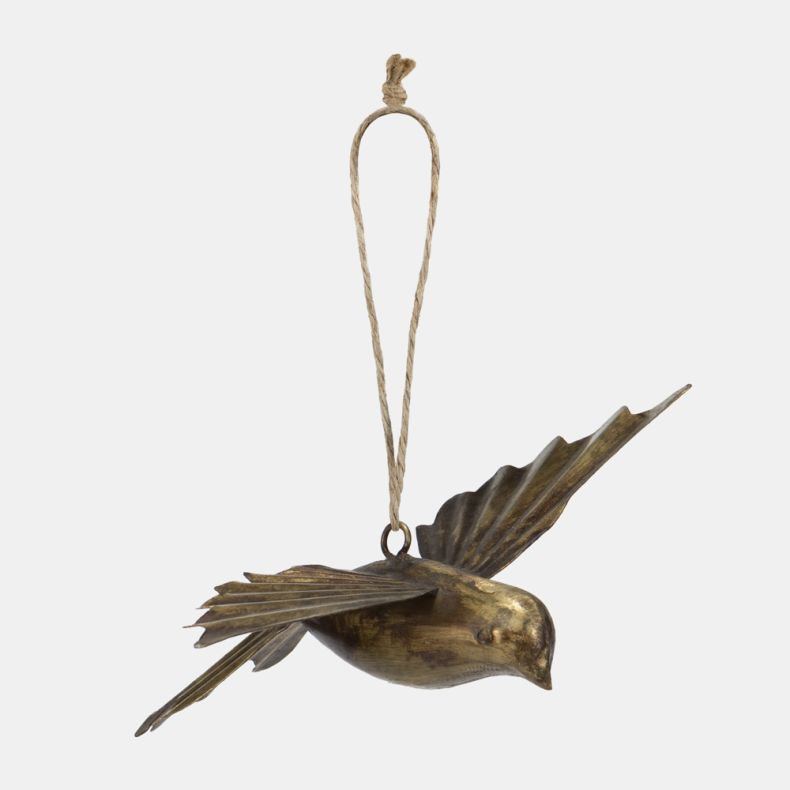 Gold-tone metal bird hanging decoration featuring a sculpted flying bird design with embossed feather detailing, an antique brass-effect finish, outstretched wings, and a rustic twine hanging loop for festive seasonal décor.