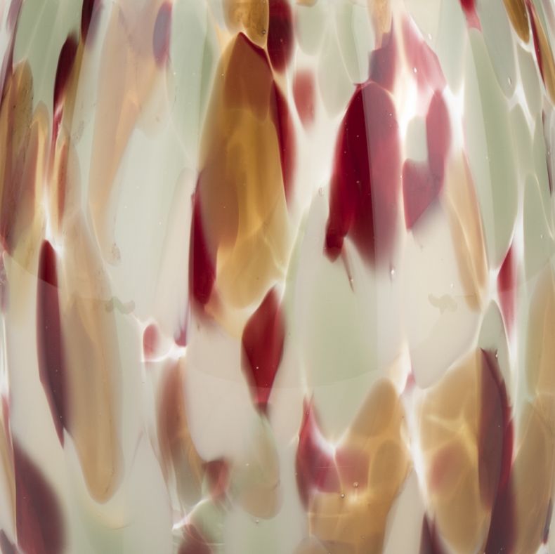 Close-up of the Recycled Glass Marbled Jug, showcasing a unique blend of cream, sage green, amber and deep red tones fused within the glass. The distinctive marbled pattern creates a decorative, artisanal look, highlighting the recycled glass construction