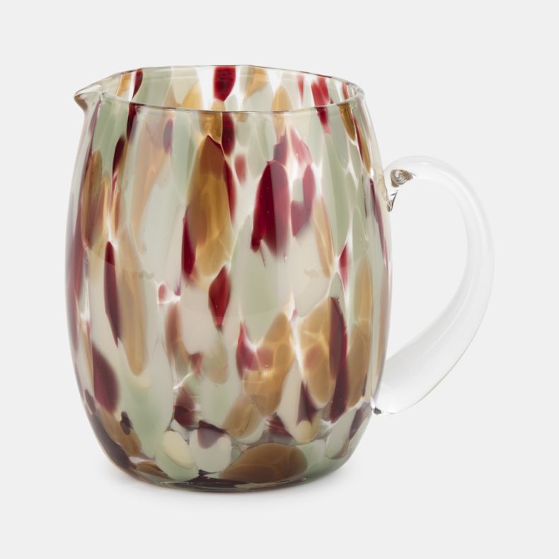 Recycled Glass Marbled Jug featuring a unique hand-crafted design with swirls of cream, sage green, amber and deep red tones. Made from recycled glass, this decorative jug combines an organic marbled effect with a clear glass handle, making it ideal for s