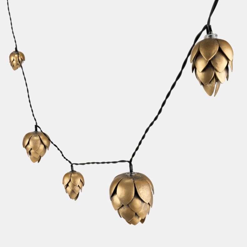 Close-up of pinecone-shaped LED outdoor string lights with metallic gold-effect pinecone covers attached to a black cable, displayed against a light grey background.