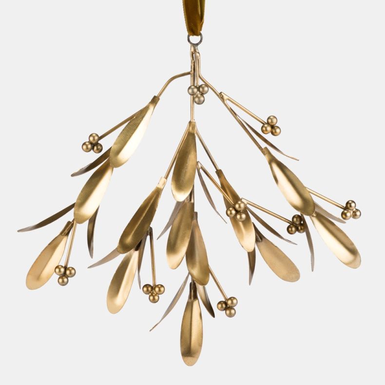 Close-up of a gold-tone mistletoe hanging decoration featuring metallic leaves, delicate branching stems and clustered berry details. The detailed view highlights the brushed metal finish and elegant craftsmanship against a plain light grey background.