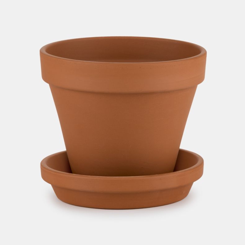Terracotta-style plant pot with a matching saucer, shown empty against a plain light background. The classic indoor planter features a warm orange-brown finish, wide rim, and drainage tray, suitable for houseplants, herbs, or flowering plants.