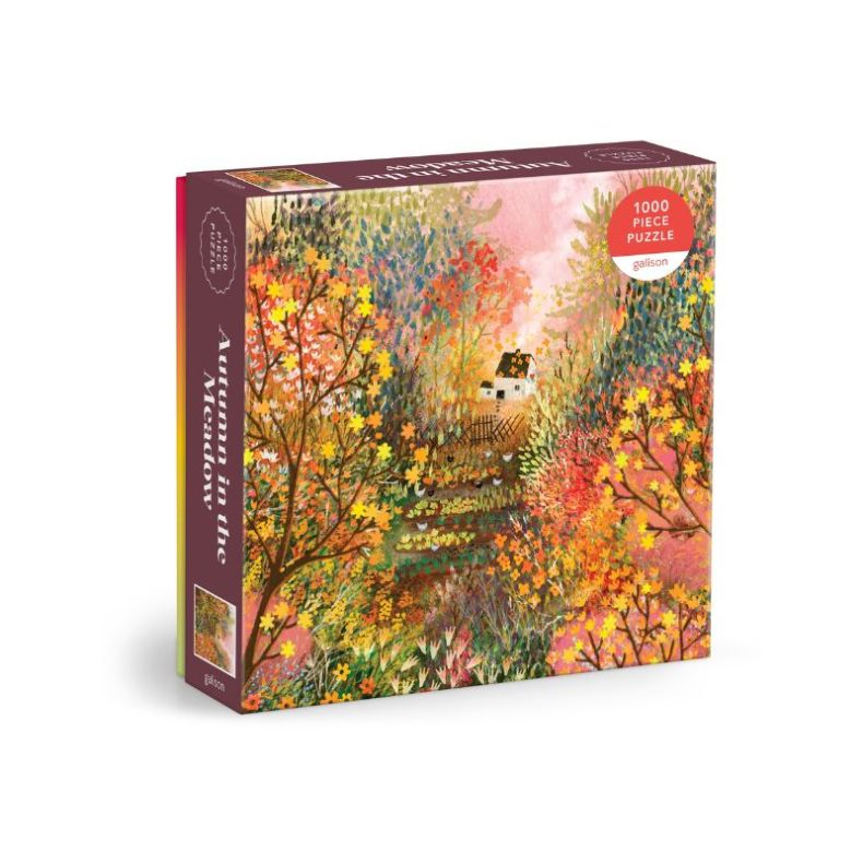 Galison Autumn in the Woodland 1000-piece jigsaw puzzle box featuring a colourful woodland landscape illustration with autumn trees, flowers, a winding path, and a cottage in the distance.