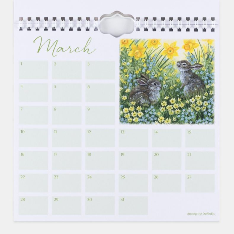 March page from a Birthdays & Special Occasions perpetual calendar, featuring a grid layout with blank date boxes for recording annual events and an illustration of two rabbits sitting among yellow daffodils and spring wildflowers, displayed beneath a spi